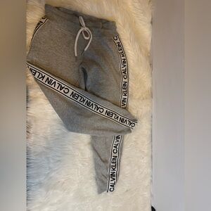 Calvin Klein size small gray performance joggers with white panel leg  stripe